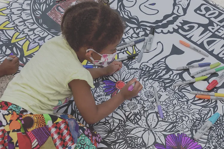 Girl painting mural