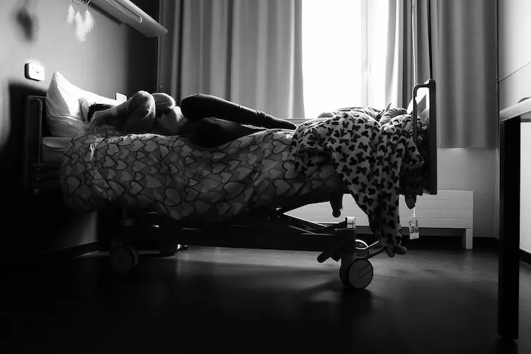Patient in hospital bed